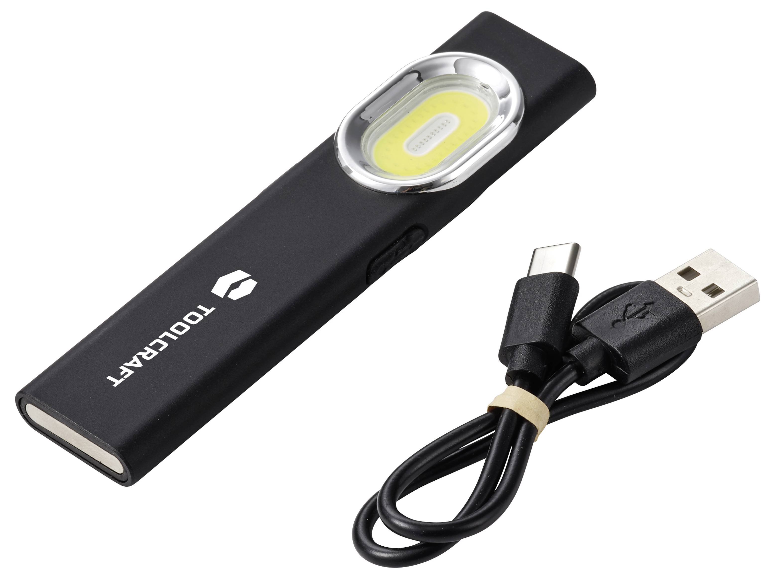 Lampada da lavoro LED ricaricabile tramite USB nera con cavo di ricarica USB-C collegato su sfondo bianco.