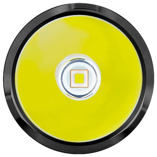 'Primo piano di un luminoso emettitore LED circolare con diffusore giallo, visto dall'alto su sfondo uniforme.'