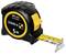 Un metro a nastro Stabila nero e giallo con un nastro in nylon avvolto da 5 metri parzialmente esteso, caratterizzato da un robusto rivestimento in gomma.