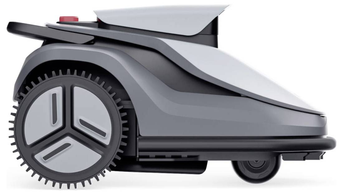 Una vista laterale di un tagliaerba robotico, con un design grigio elegante caratterizzato da grandi ruote con texture e un pulsante di controllo rosso montato posteriormente.