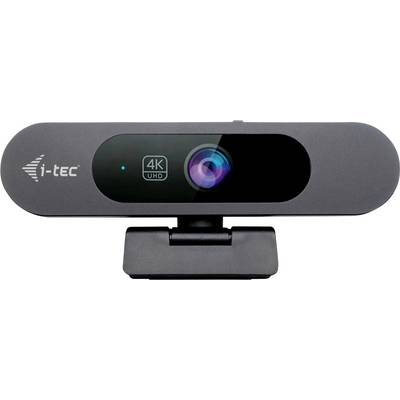 Una webcam i-tec nera con etichetta '4K UHD', dotata di un obiettivo centrale. Il dispositivo è montato su una clip, adatto per videoconferenze.