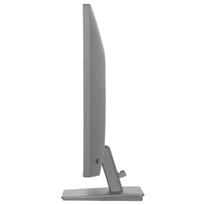 Una vista laterale di un sottile monitor per computer moderno su un piedistallo quadrato, che evidenzia il suo profilo elegante.