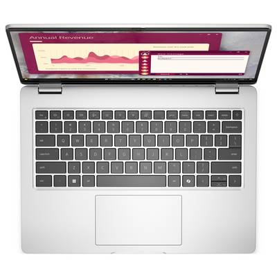 Un laptop d'argento che visualizza uno schermo con un grafico "Ricavi Annuali" che mostra un trend fluttuante, evidenziando un'interfaccia di presentazione.