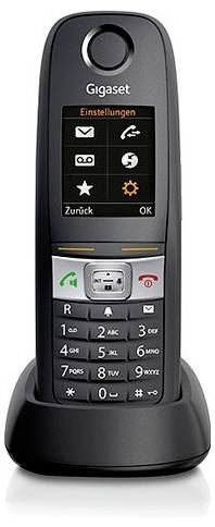 Un telefono wireless nero Gigaset su una base di ricarica, che visualizza sullo schermo icone per messaggi, contatti, impostazioni e altri servizi.