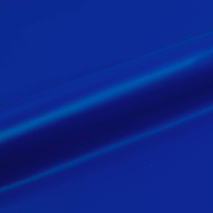 Una superficie liscia, lucida e blu profondo con una linea diagonale evidenziata che la attraversa, che suggerisce una texture riflettente o metallica.