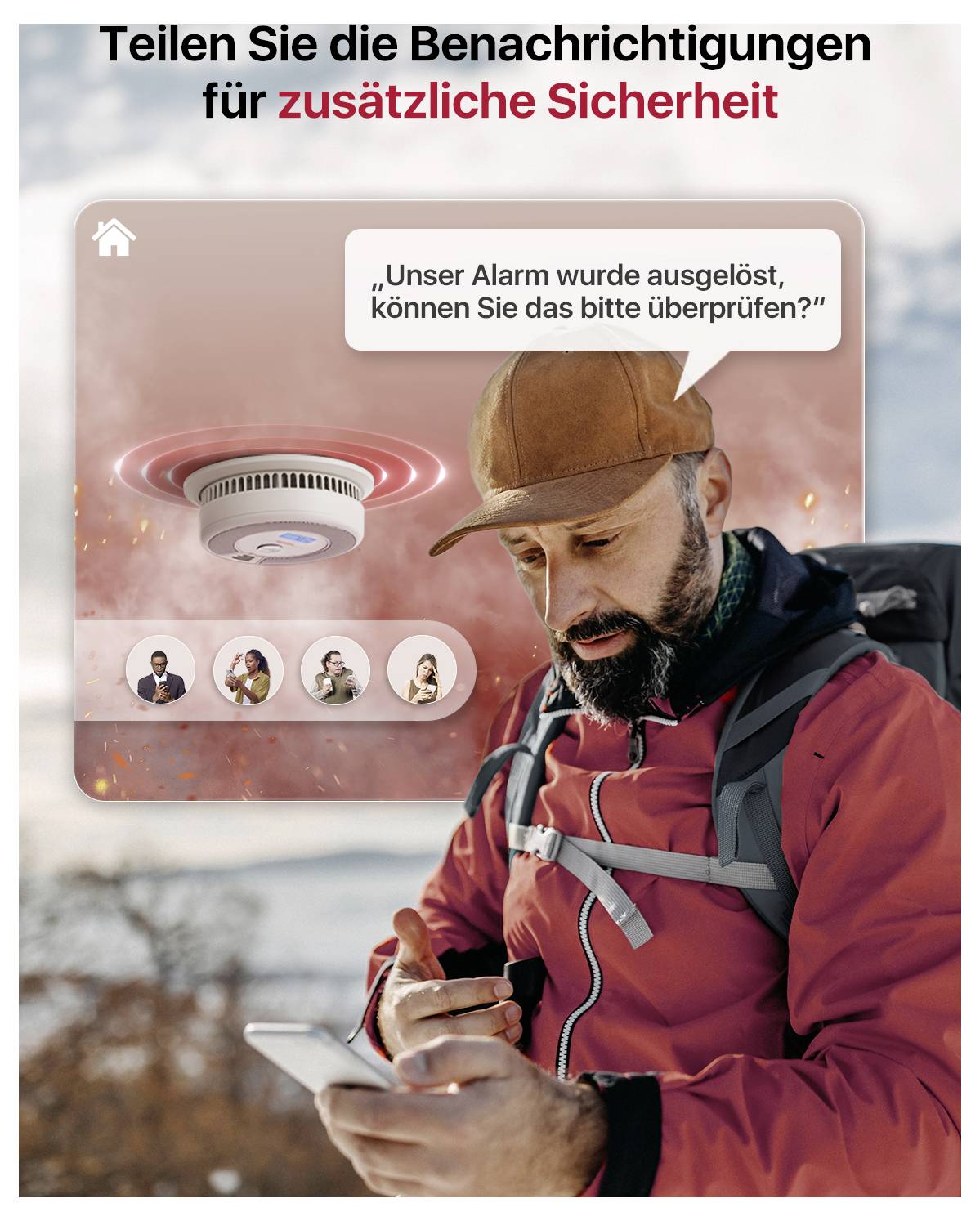 Un uomo controlla il suo smartphone. Lo schermo mostra una notifica del rilevatore di fumo con la domanda se l'allarme può essere verificato.