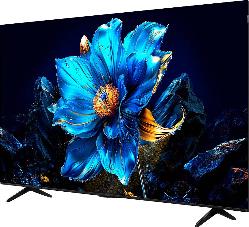 Un vivido fiore blu con accenti arancioni appare su uno sfondo scuro, assomigliando a uno schermo televisivo con colori vibranti.