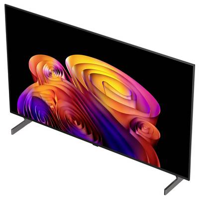 Un televisore a schermo piatto su piedini espone un vivido turbine astratto di forme arancioni, rosa, viola e rosse su uno schermo nero.