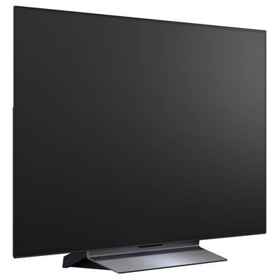 Un televisore a schermo piatto con uno schermo scuro vuoto su un supporto, mostrato su uno sfondo bianco uniforme.