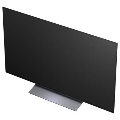 TV a schermo piatto con display nero su un supporto argentato, mostrato in angolazione su uno sfondo bianco.
