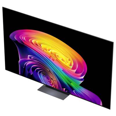 TV ultra sottile a schermo piatto che visualizza un vivace turbine astratto multicolore su sfondo nero, mostrato su un supporto contro uno sfondo bianco