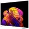 TV a schermo piatto che mostra forme 3D vorticose e colorate astratte su uno sfondo nero.