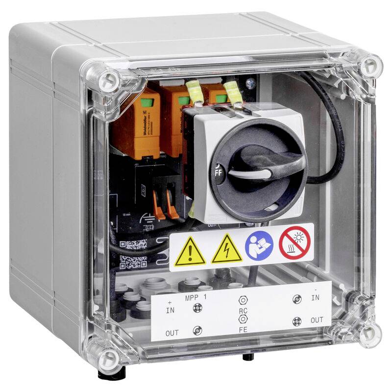 Quadro di controllo elettrico industriale con coperchio trasparente, interruttore rotativo, etichette di avvertimento e morsetti di ingresso/uscita sul pannello frontale.