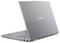 Laptop Lenovo chiuso mostrato in una vista laterale, evidenziando il design sottile grigio e la tastiera parzialmente visibile.
