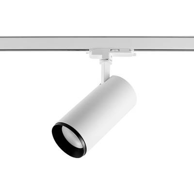 Riflettore orientabile a binario bianco con testata cilindrica regolabile inclinata verso il basso su una guida a soffitto.