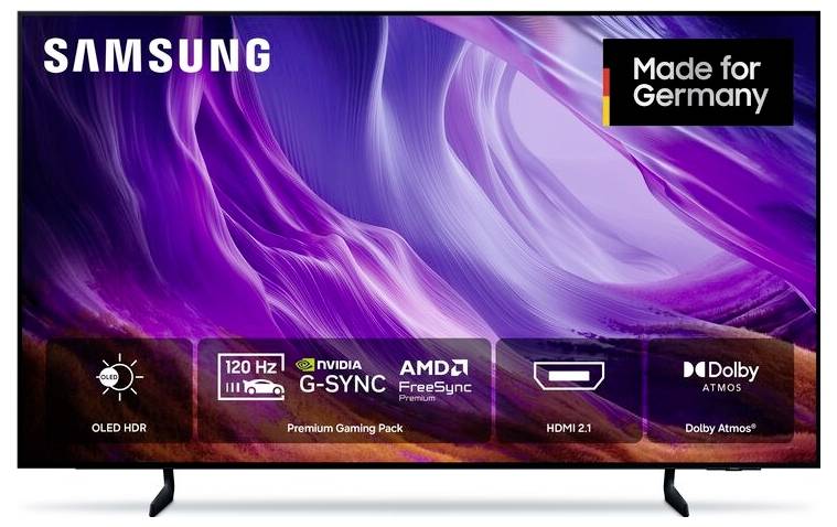 Samsung TV OLED su supporto con grafica astratta viola sullo schermo e badge delle caratteristiche: 120 Hz, NVIDIA G-SYNC, AMD FreeSync Premium, HDMI 2.1, Dolby Atmos, Made for Germany.