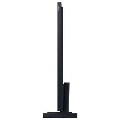 Espositore da pavimento alto di colore nero con una base ampia e un supporto verticale stretto, mostrato su uno sfondo bianco.
