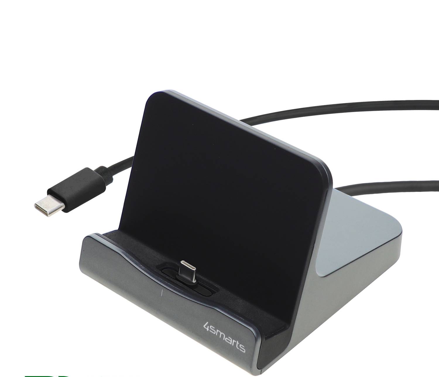 Dock di ricarica USB-C con uno smartphone nero appoggiato in posizione verticale su un supporto L.Smarts, con cavo collegato su sfondo bianco