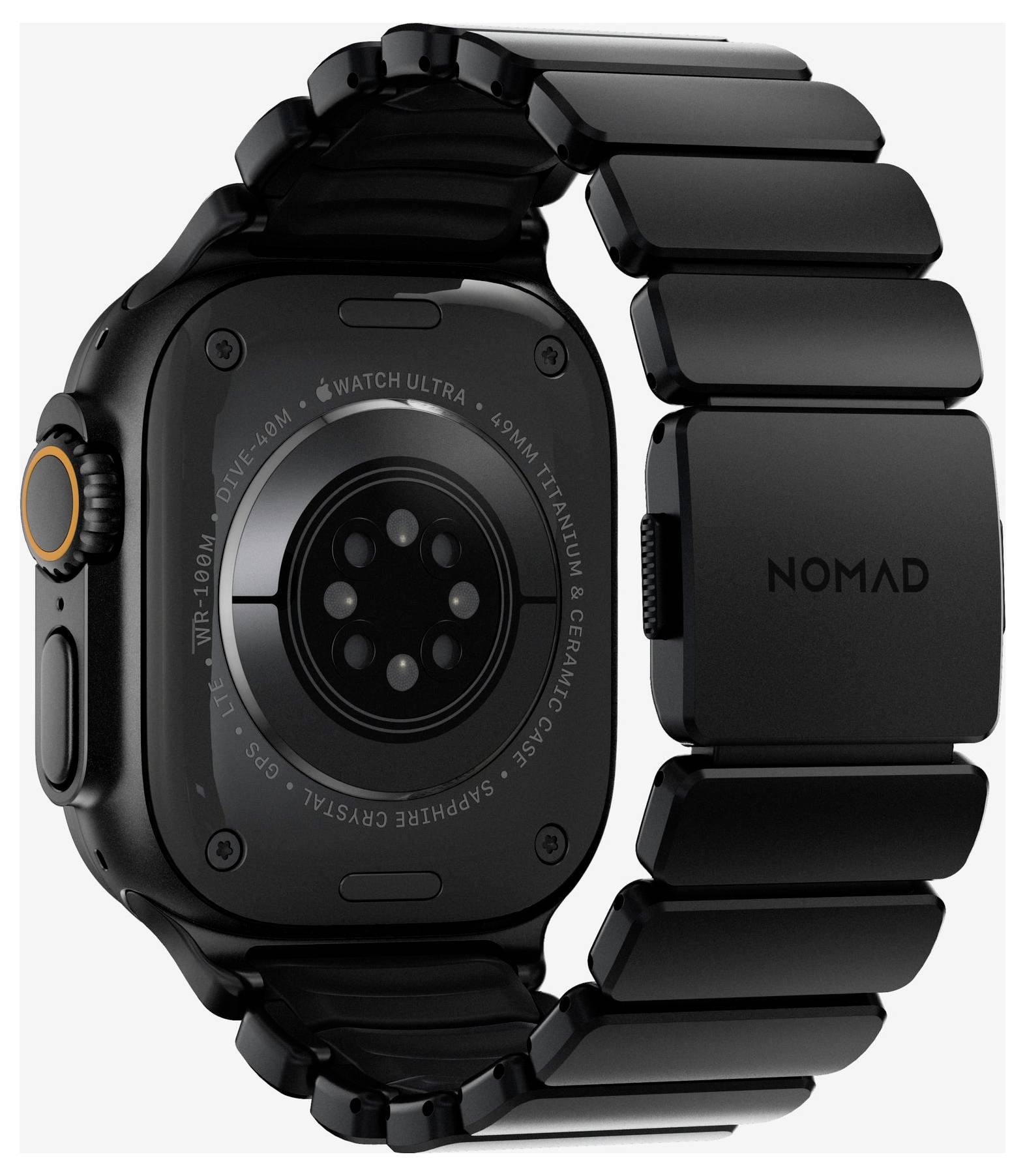 Apple Watch Ultra nero mostrato da dietro con cinturino Nomad nero collegato, evidenziando la cassa, l'array di sensori e il design robusto.
