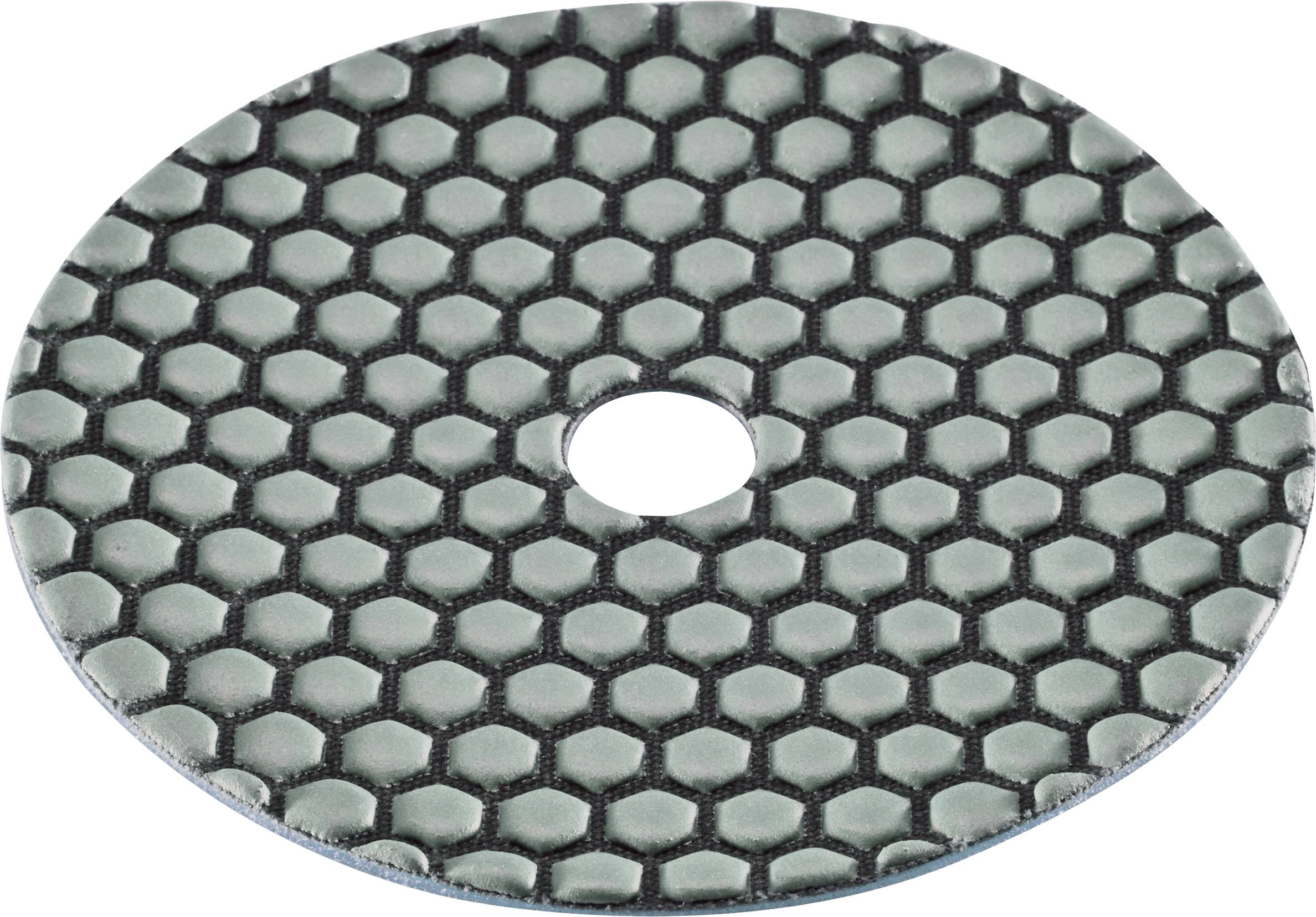 Griglia o filtro a nido d'ape nero ovale con un piccolo foro centrale, mostrato su uno sfondo bianco.