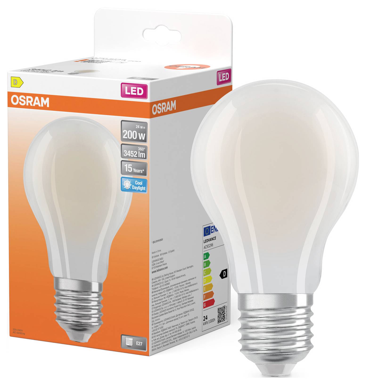 Etichetta di confezionamento della lampada LED che mostra:<br>- Classe energetica UE: B<br>- Flusso luminoso: 907 lm<br>- Temperatura colore: 2700 K bianco caldo<br>- Consumo energetico: 5 kWh/1000h<br>- Simboli di riciclaggio/smaltimento