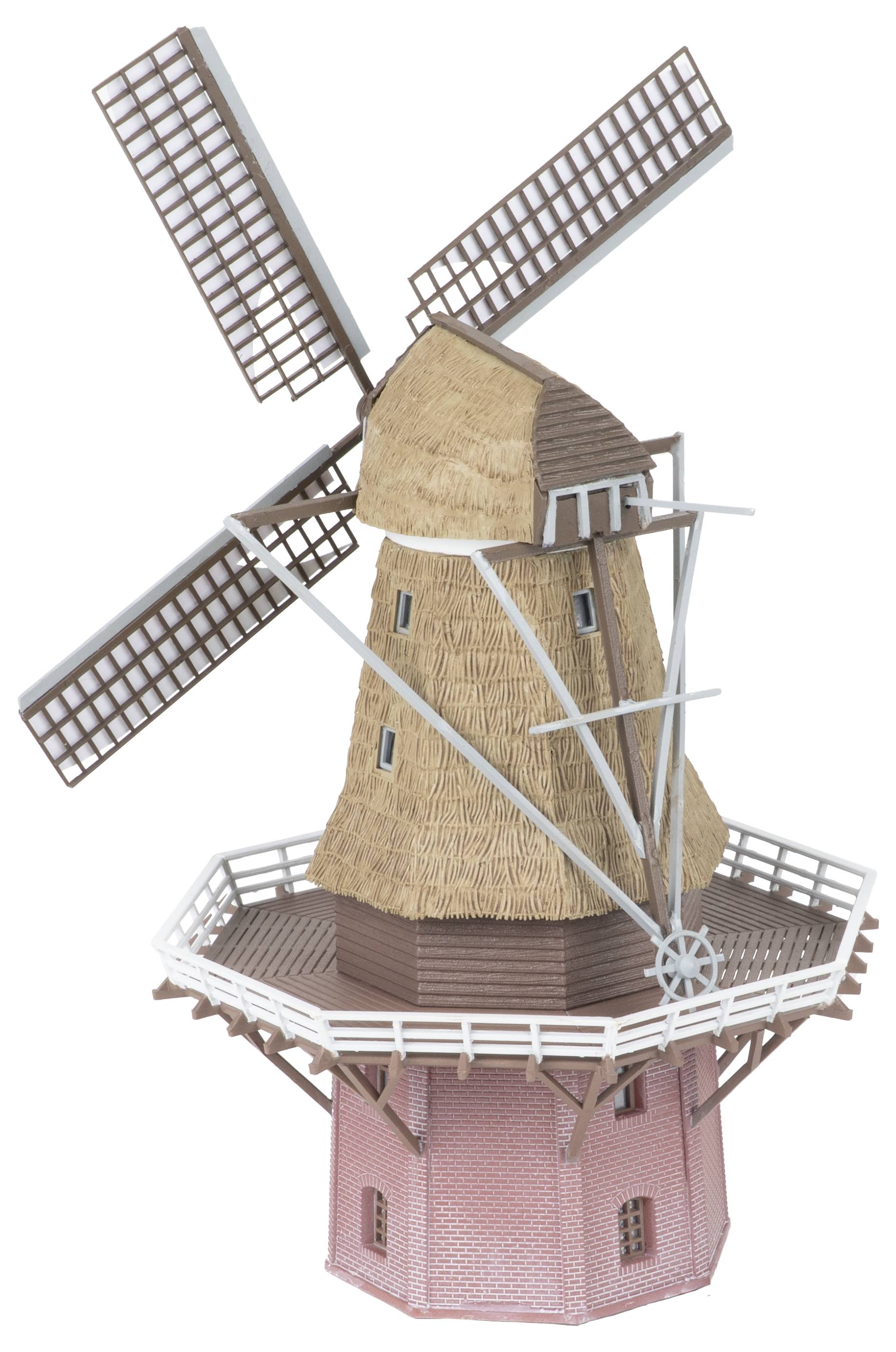 Modello di un mulino a vento tradizionale con quattro pale, una torre marrone con tetto di paglia e una base rosa su sfondo bianco.
