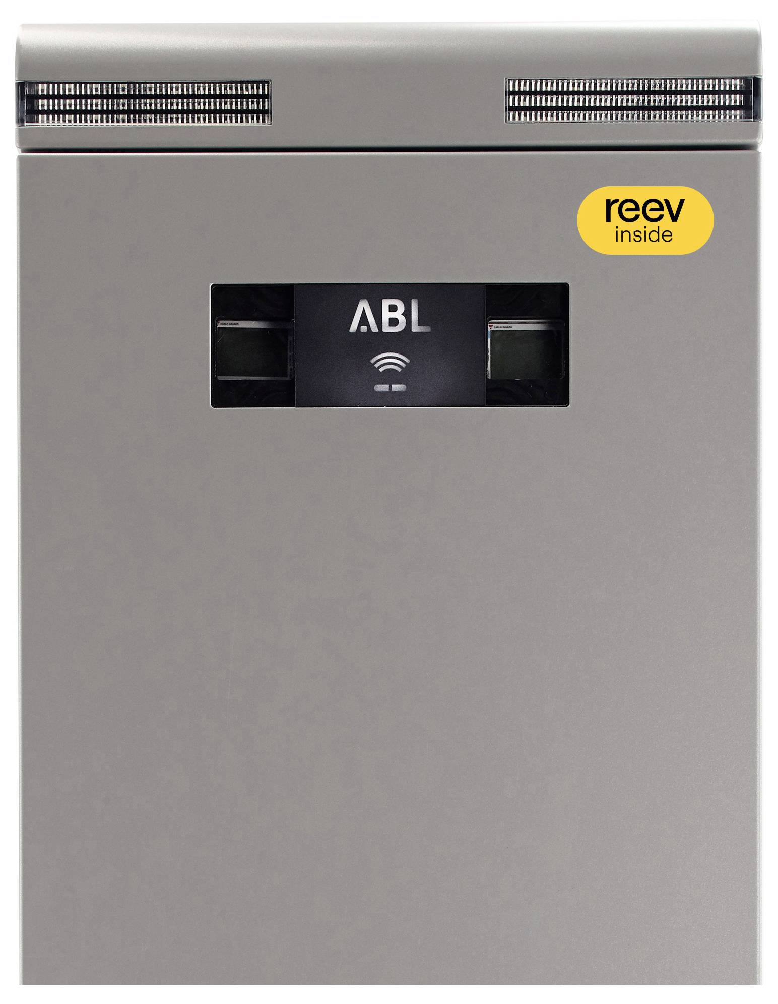 Pannello dispositivo ABL grigio con aperture di ventilazione e una piccola finestra che mostra un simbolo wireless e l'etichetta 'reev inside'.