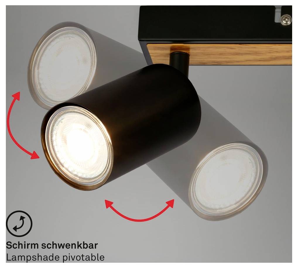 Faretto da soffitto orientabile di colore nero con paralume cilindrico mostrato nella posizione di rotazione, con frecce che indicano che il paralume può ruotare.