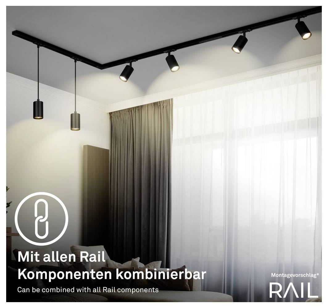 Sistema moderno di illuminazione su binario a soffitto nero con più faretti regolabili in una stanza; il testo dice 'Combinabile con tutti i componenti Rail' e 'Può essere combinato con tutti i componenti Rail'.
