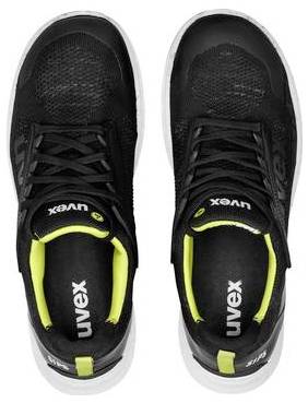 Paio di scarpe atletiche Uvex nere con accenti verde lime, visualizzate da sopra su uno sfondo bianco.