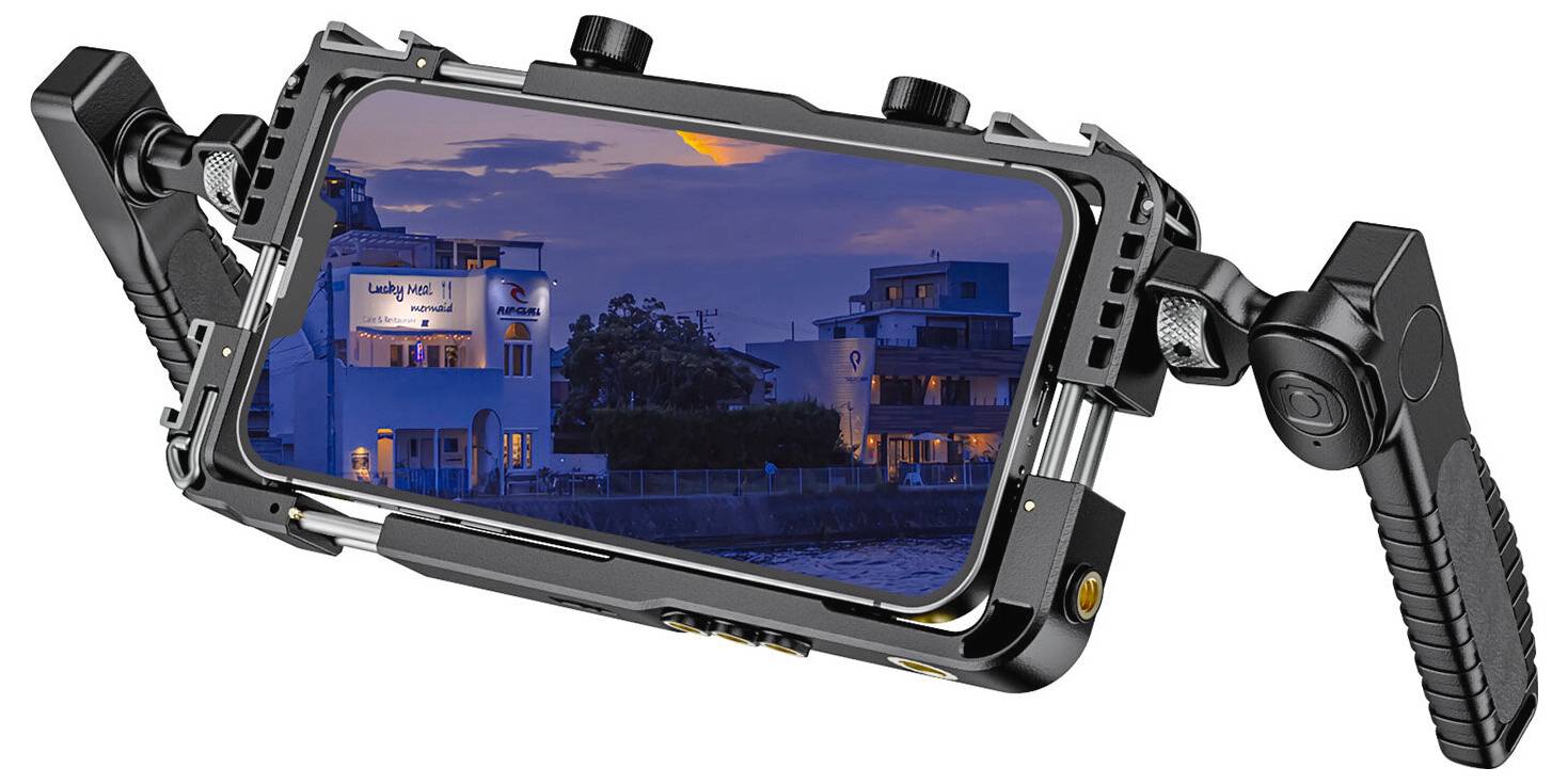 Gabbia robusta per smartphone con doppi manici laterali, che mostra un telefono che riprende un edificio sul lungomare al tramonto.