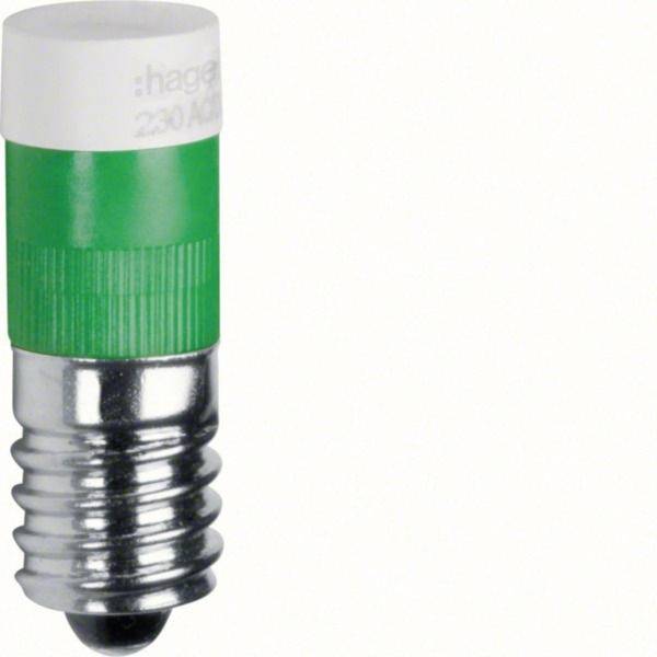 Primo piano di una lampadina indicatrice LED verde e argento su sfondo bianco.