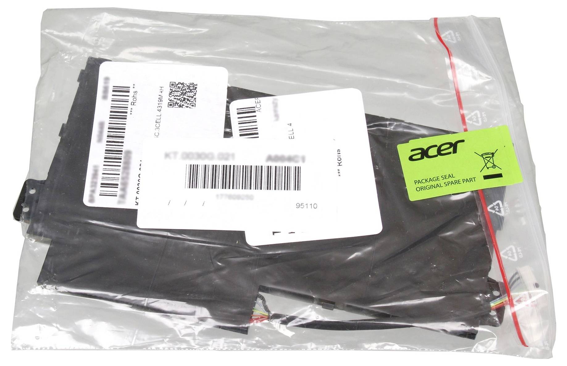 Borsa di plastica contenente un pezzo di ricambio originale Acer etichettato con etichette di spedizione con codice a barre bianco.