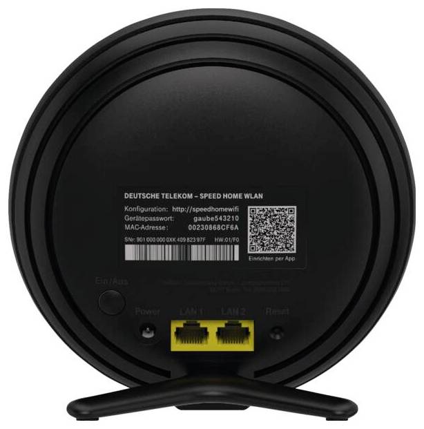 Router WLAN Deutsche Telekom Speed Home nero e rotondo che mostra l'etichetta, il codice QR, il pulsante di accensione e due porte Ethernet gialle con supporto.