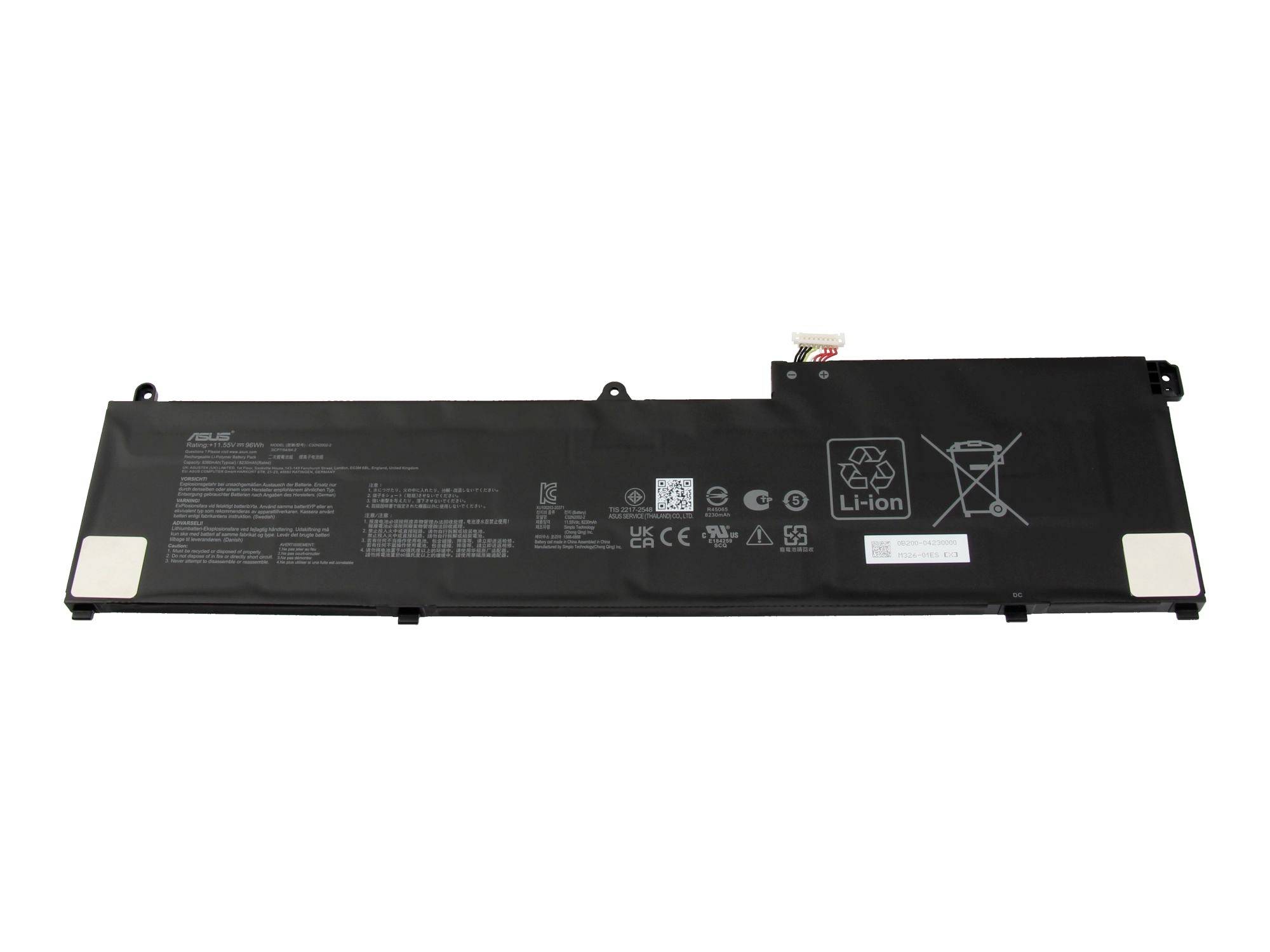 Pacco batteria per laptop nero con connettori ed etichette di avvertenza su sfondo bianco