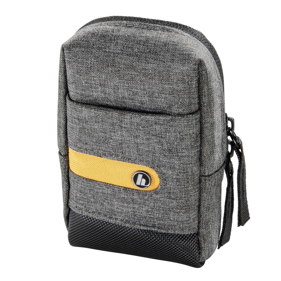 Borsa da viaggio grigia con cerniera con nastro di accento giallo e base nera, mostrata su sfondo bianco.