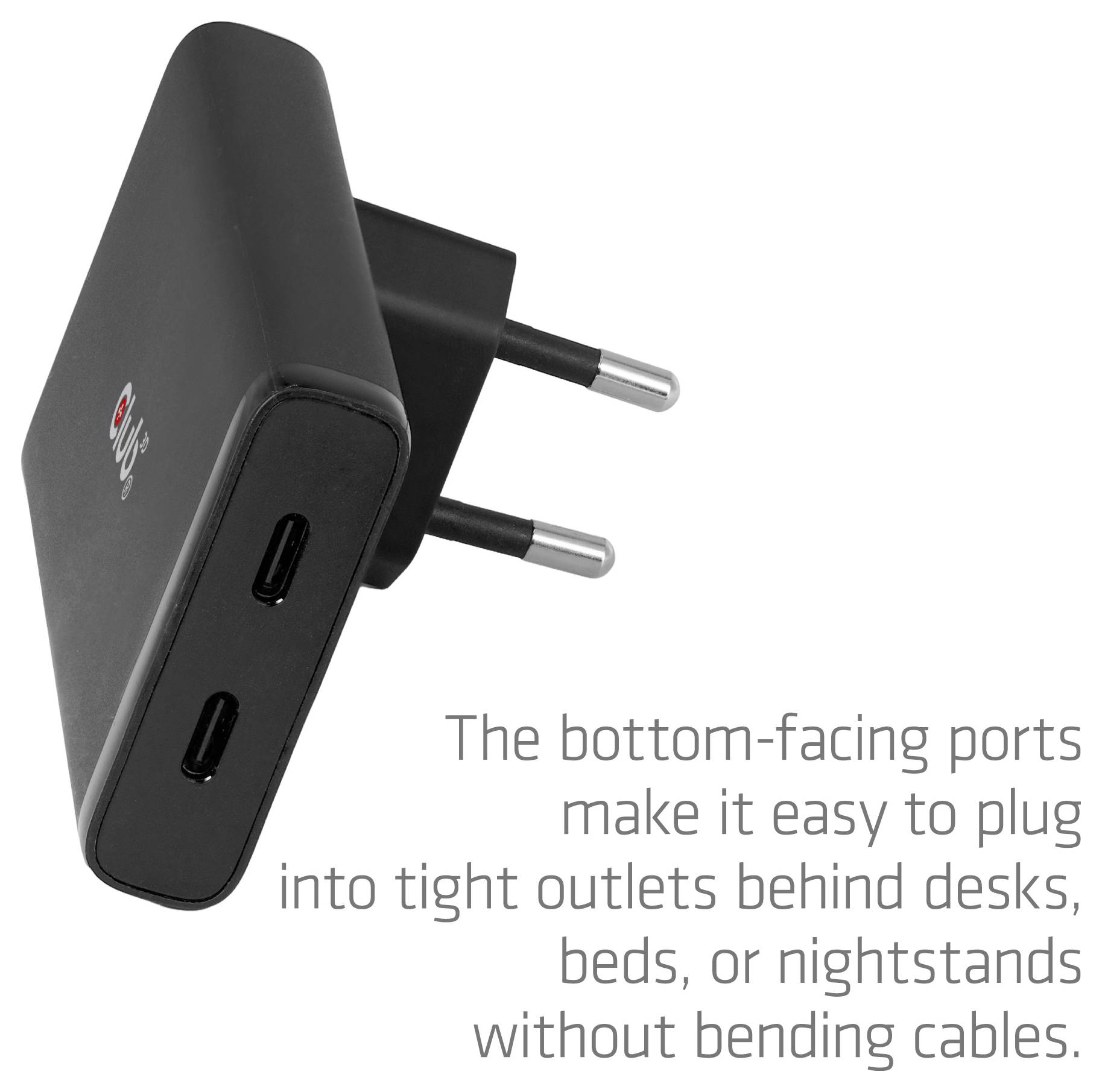 Caricabatterie da parete in stile angolare con due porte USB-C sul fondo; la didascalia afferma che si adatta perfettamente alle prese strette dietro scrivanie, letti o comodini senza piegare i cavi.