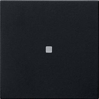 Piastrella murale quadrata nera con un piccolo quadrato grigio chiaro centrato su di essa.