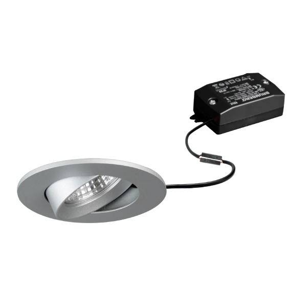 Faretto LED incassato con cornice in argento, collegato tramite cavo a un'unità driver di colore nero.