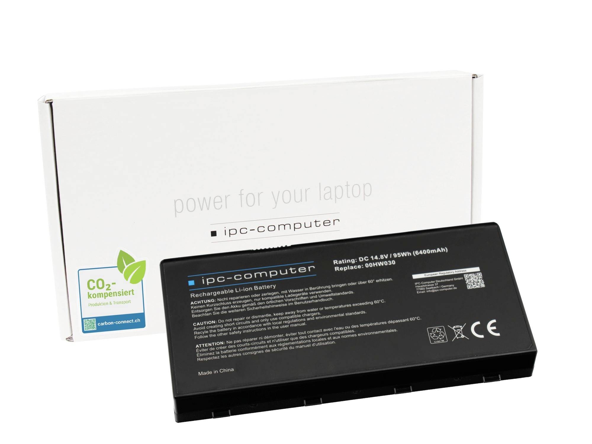 Batteria ricaricabile per laptop IPC-computer nera di fronte a confezione bianca etichettata "power for your laptop" e "CO2-kompensiert".