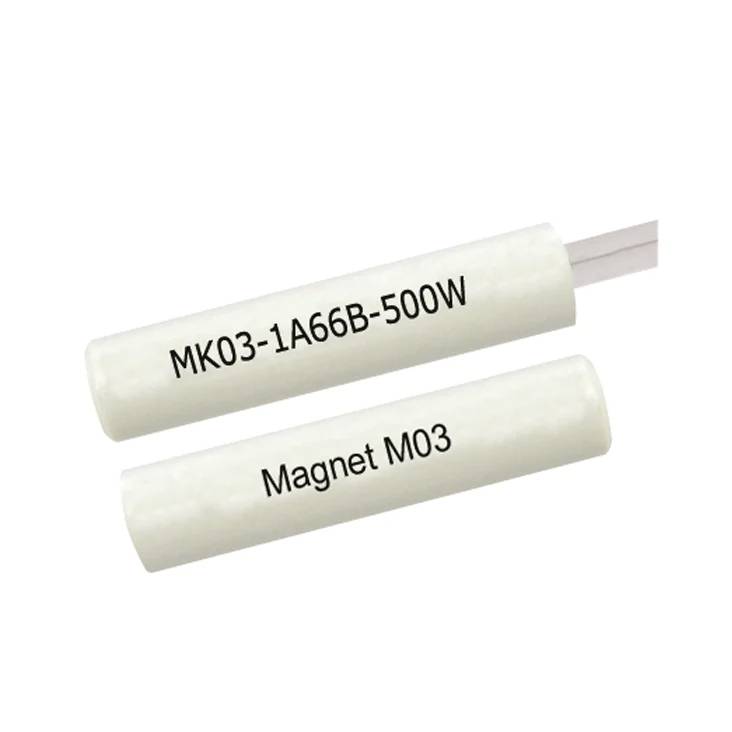 Due sensori magnetici cilindrici bianchi etichettati 'MK03-1A66B-500W' e 'Magnet M03' su uno sfondo uniforme.