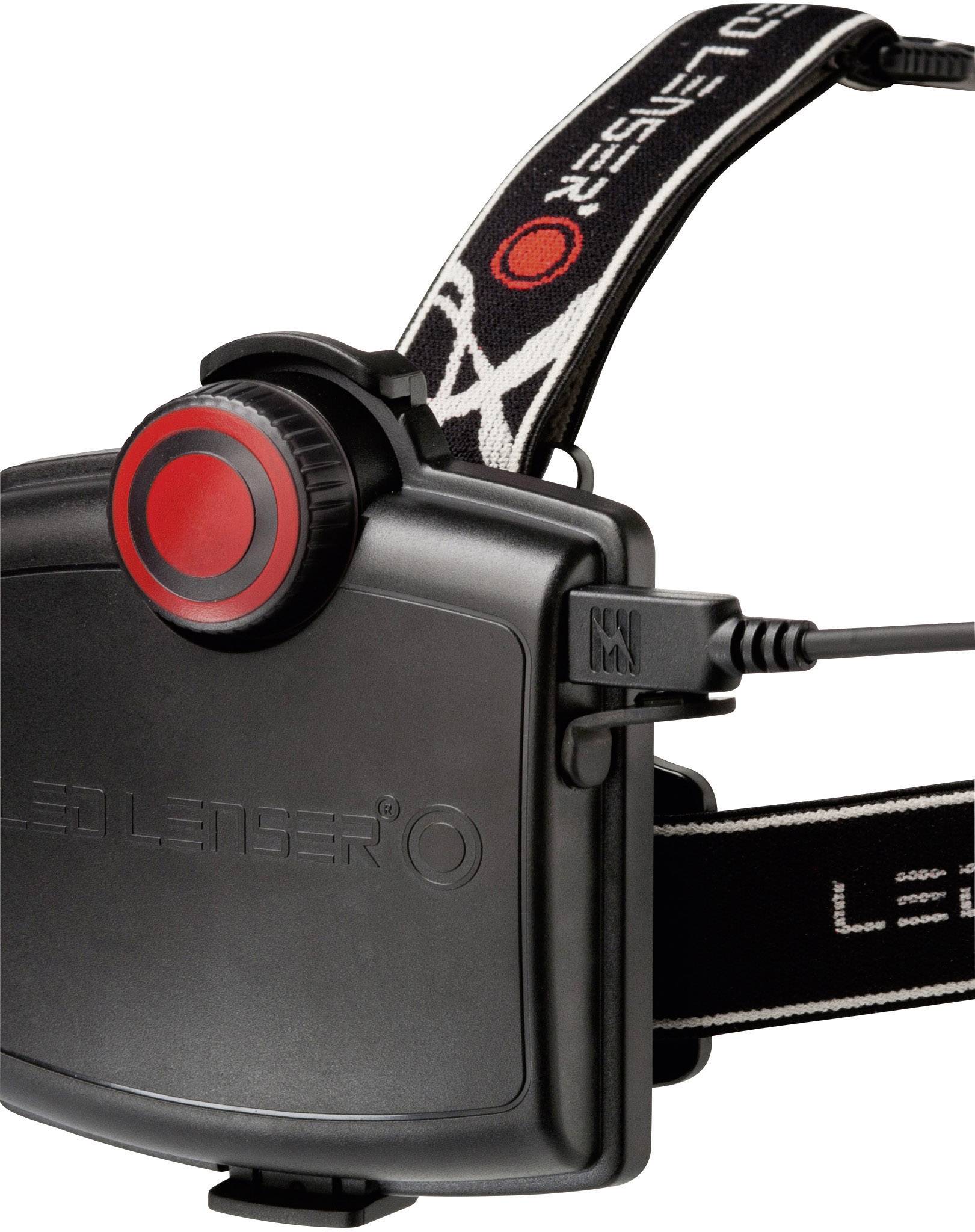Fascia frontale LED Lenser nera con cerchio rosso sulla scatola della batteria e porta USB. Adatta per attività all'aperto al buio.