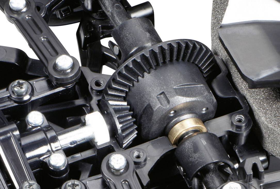 Primo piano di un ingranaggio a ingranazione in metallo nero, integrato in un'unità meccanica con viti e connessioni circostanti.
