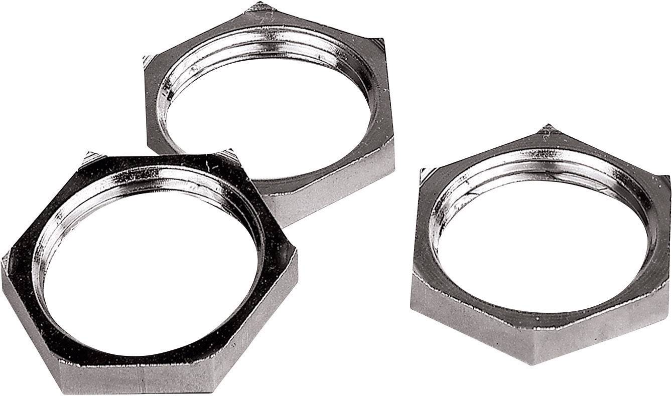 Tre dadi esagonali metallici in primo piano su uno sfondo chiaro.