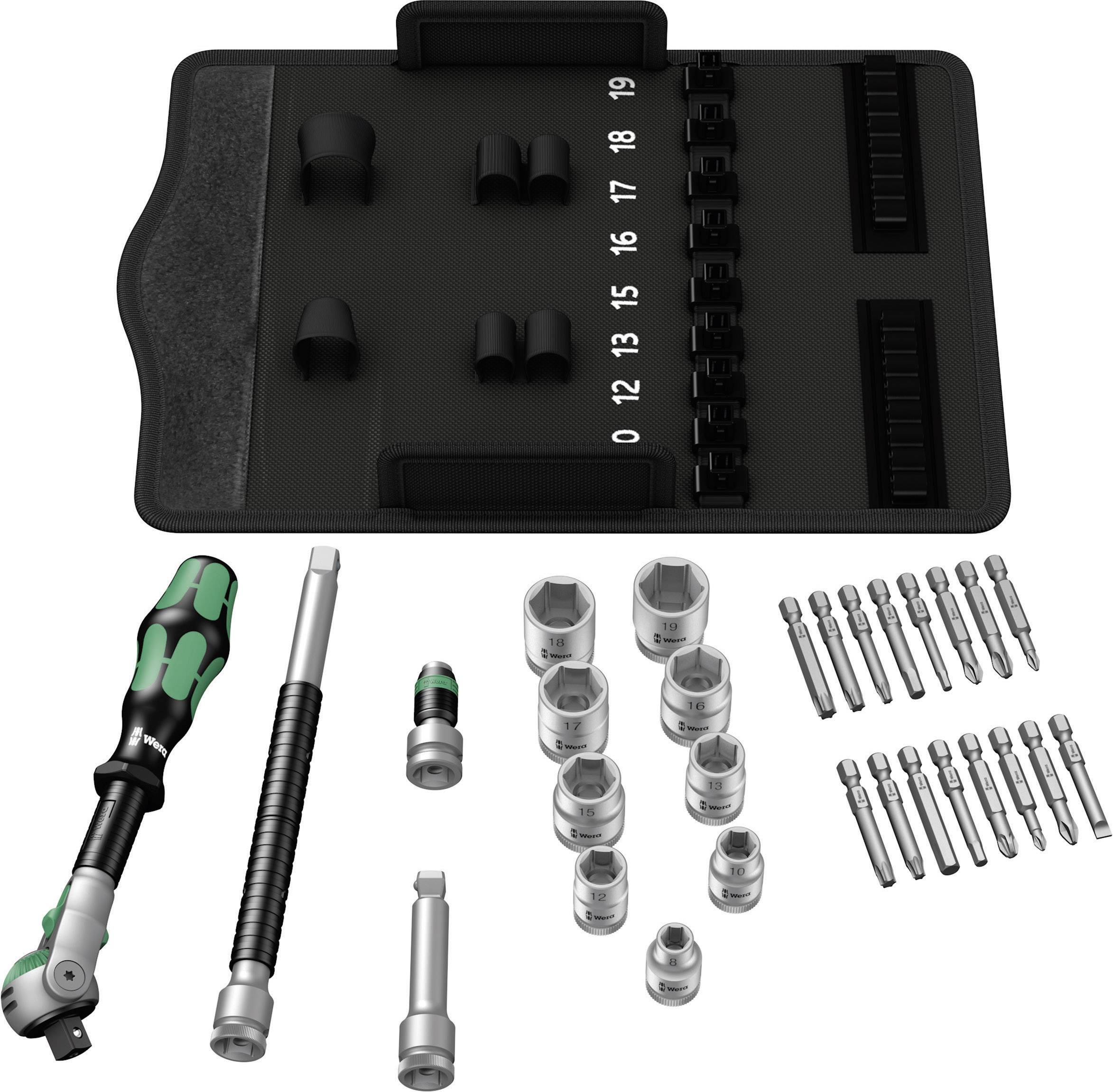 Set di attrezzi nero-verde composto da chiave a cricchetto, bussole e inserti, organizzato su una base di supporto con indicazioni delle dimensioni.
