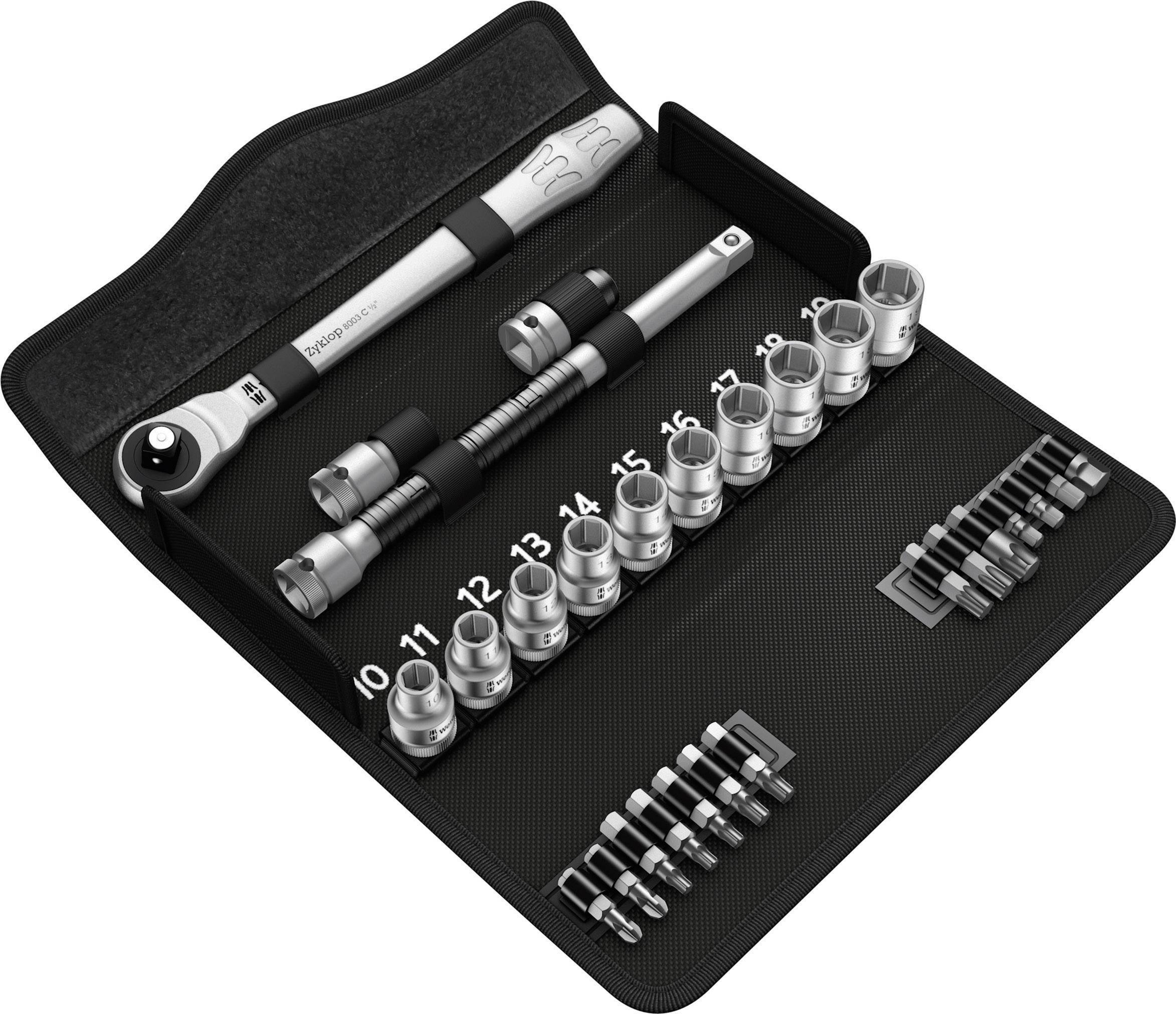 Un set di utensili con chiavi a bussola e bit, aperto in una borsa portautensili nera. Le dimensioni da 0 a 13 sono chiaramente contrassegnate.