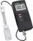 'VOLTCraft PH-212 Misuratore di pH da terra' indica 0,0 pH. Collegato a un elettrodo pH e a un liquido di calibrazione. Utilizza alimentazione elettrica.