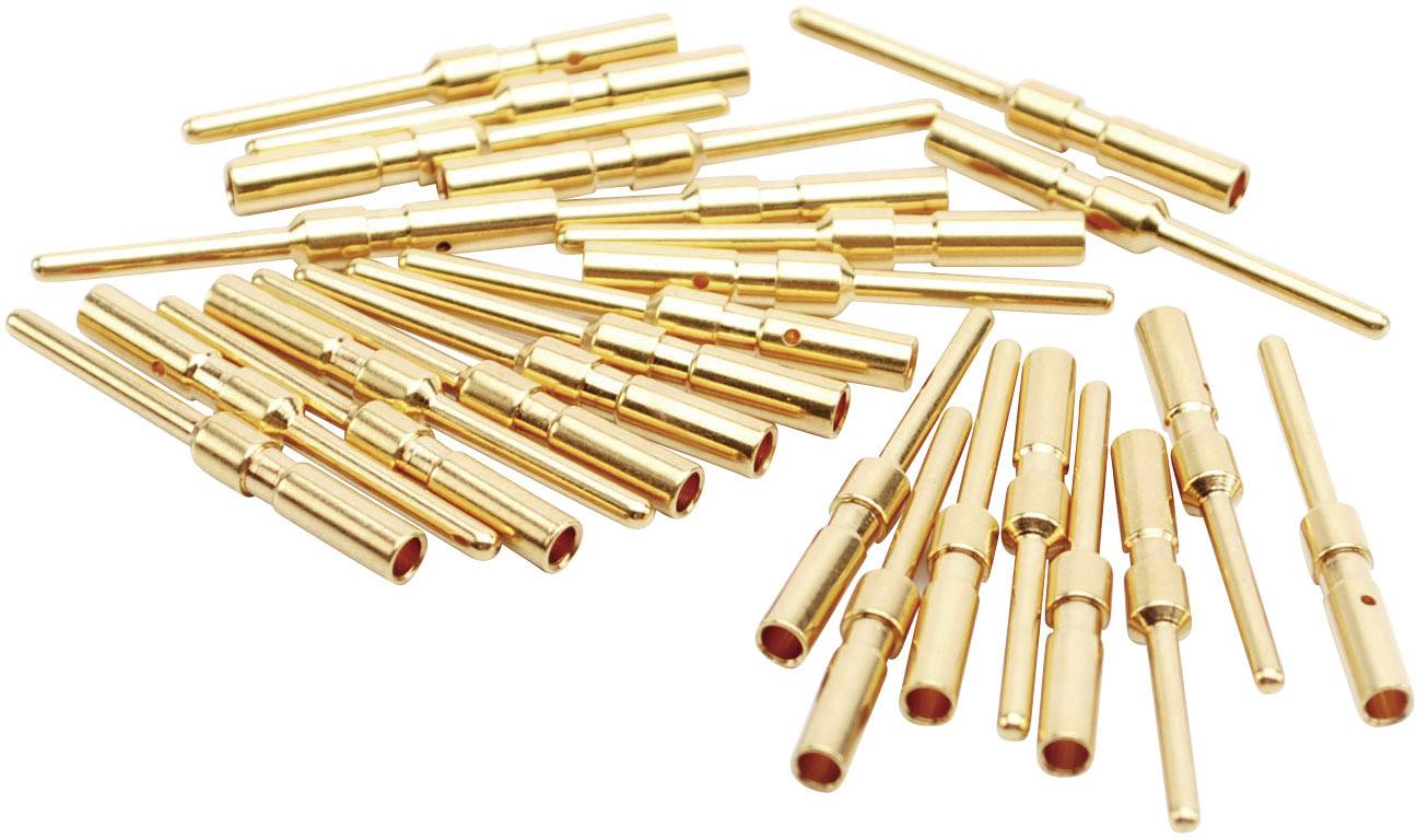 Diversi perni metallici color oro, probabilmente connettori, sono sparsi su una superficie bianca.
