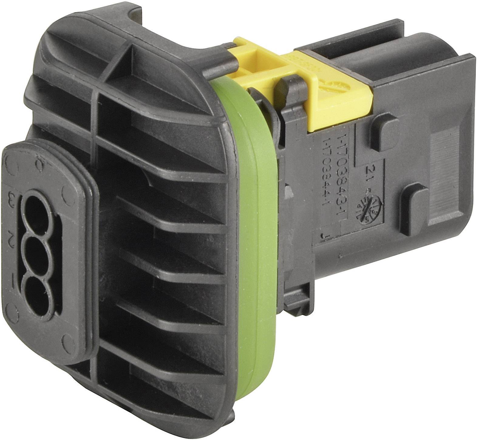Un connettore elettrico nero, rettangolare, con clip gialla e guarnizione verde, vista laterale.
