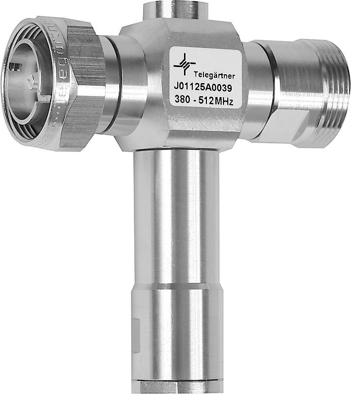 Un pezzo di metallo argentato a forma di T con l'etichetta 'Telegärtner J01125A0039 380 - 512MHz', utilizzato nella tecnologia delle comunicazioni.